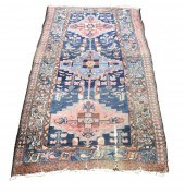 A PERSIAN HAMADAN CARPET A Per