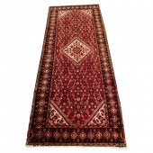 A PERSIAN HAMADAN RUNNER A Per