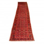 A PERSIAN HAMADAN RUNNER A Per