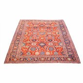 A PERSIAN HERIZ CARPET A Persi