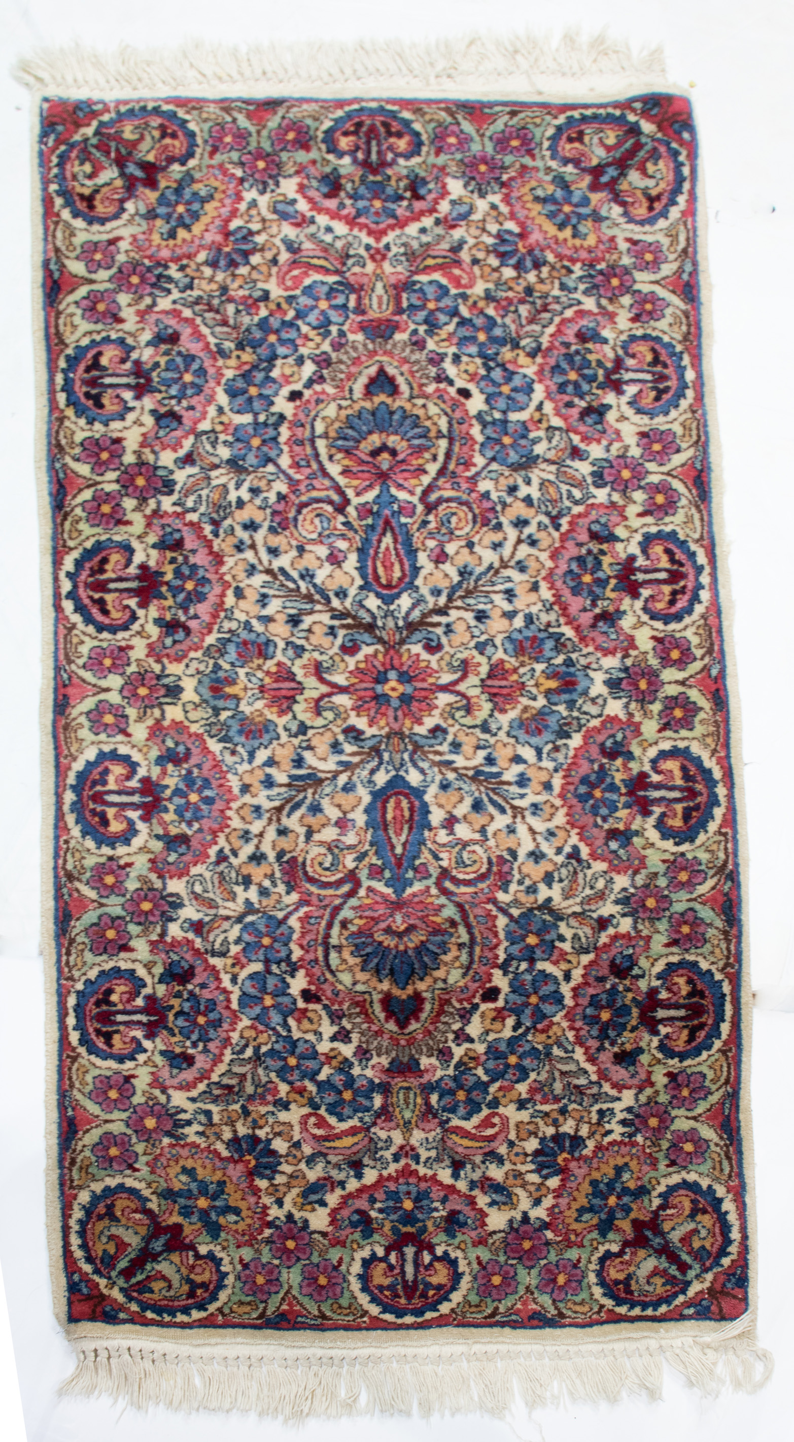 A PERSIAN KERMAN RUNNER A Persian