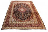 A PERSIAN MASHAD CARPET A Pers