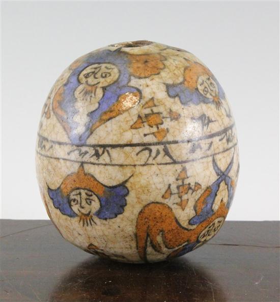 A Persian pottery ovoid ornament