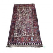 A PERSIAN QASHQAI CARPET A Per