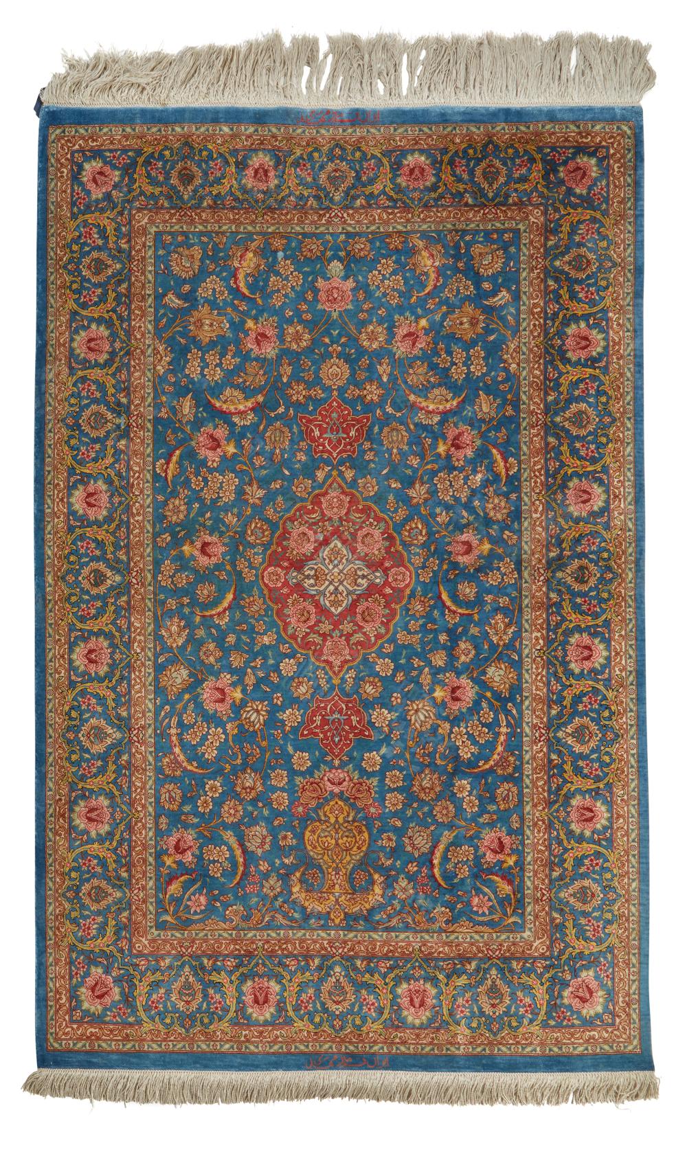 A PERSIAN QOM RUGA Persian Qom rug,