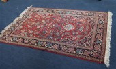 A Persian rug with field of sc