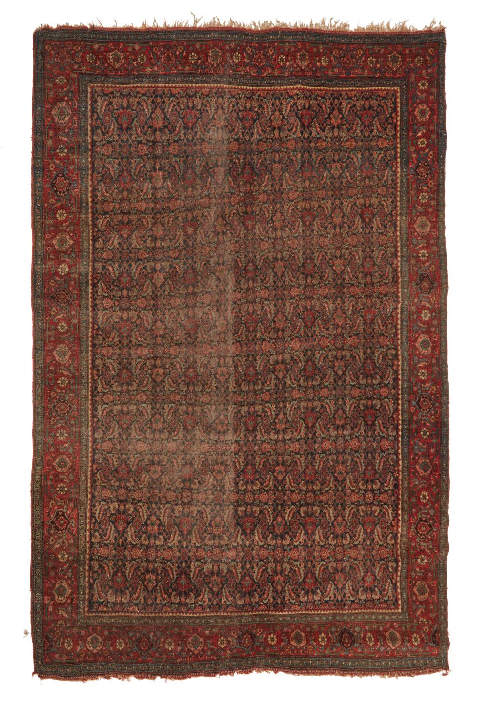 A PERSIAN RUGA Persian rug,  20th
