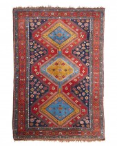 A PERSIAN RUGA Persian rug,  L