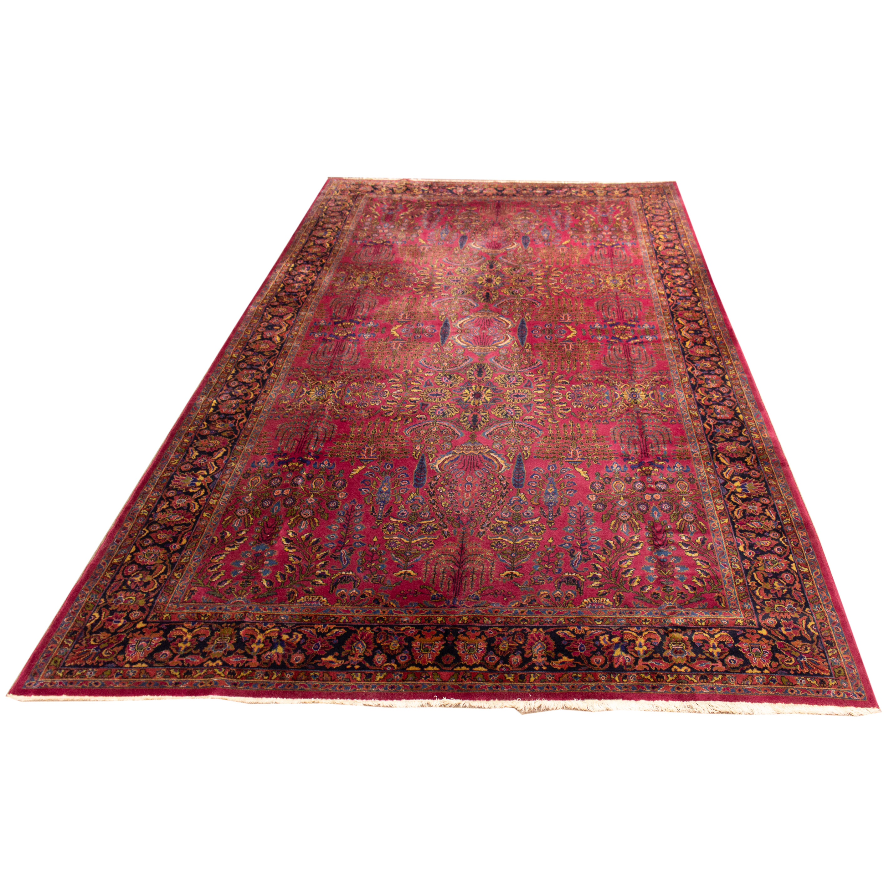 A PERSIAN SAROUK CARPET, 16'4" X