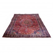 A PERSIAN SAROUK CARPET, 6'8"
