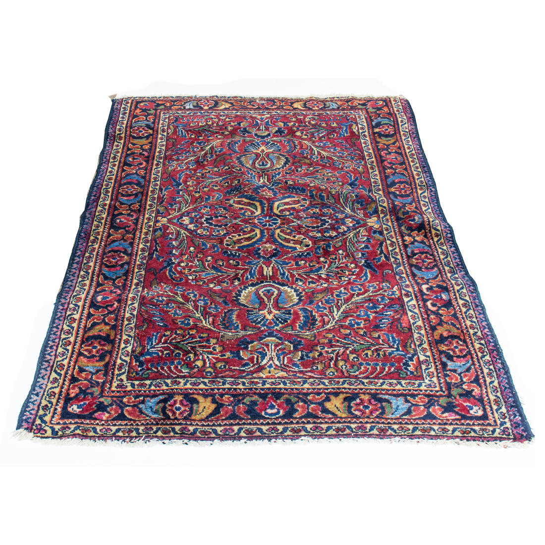 A PERSIAN SAROUK CARPET A Persian