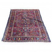 A PERSIAN SAROUK CARPET A Pers