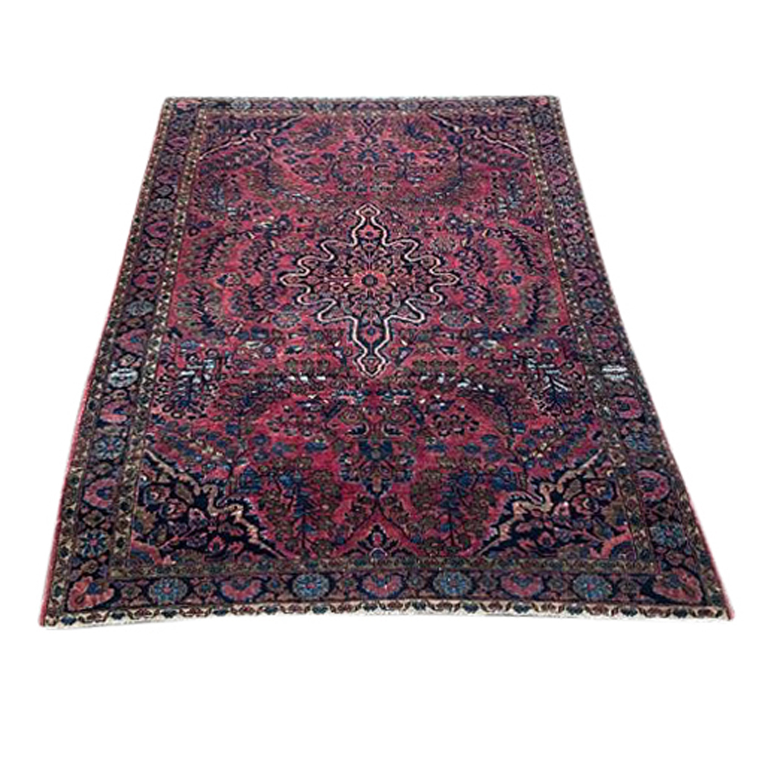 A PERSIAN SAROUK CARPET A Persian