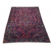 A PERSIAN SAROUK CARPET A Pers