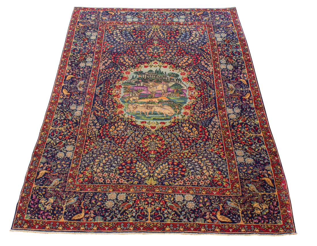 A PERSIAN SCENIC KERMAN CARPET A