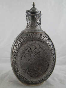 A Persian silver cased glass bottle