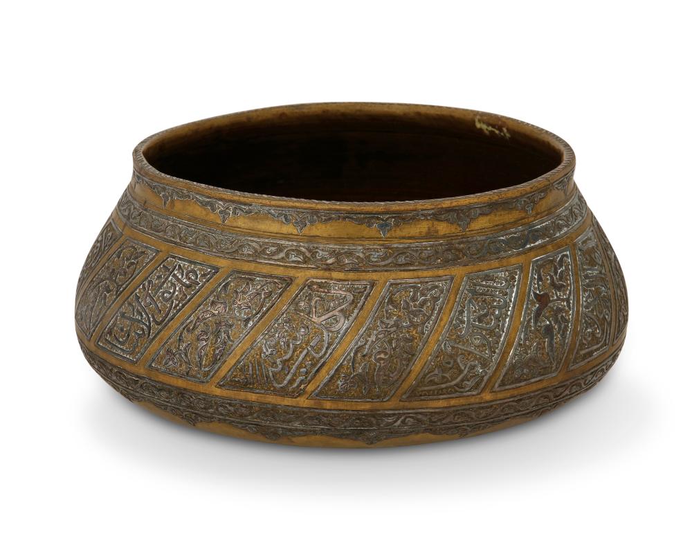 A PERSIAN SILVER OVERLAY BRONZE