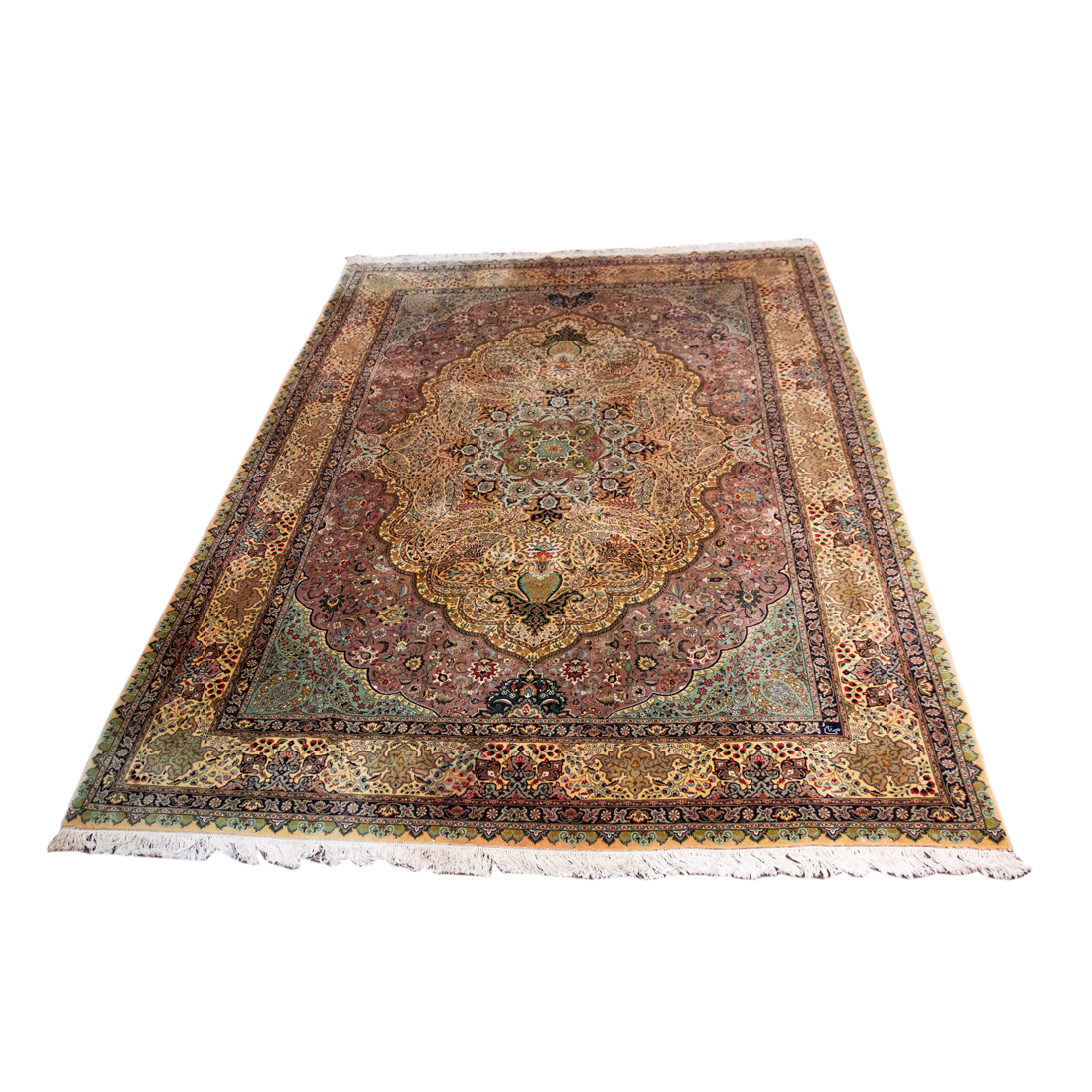 A PERSIAN TABRIZ CARPET A Persian