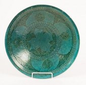 A Persian turquoise glazed cer