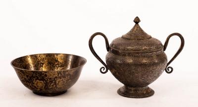 A Persian white metal jar and