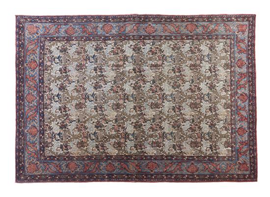 A Persian Wool Carpet decorated