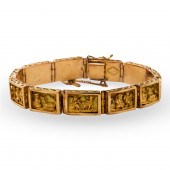 A PERUVIAN EIGHTEEN KARAT GOLD