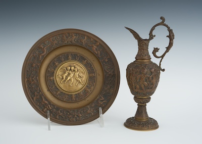 A Petite Bronze Ewer With Liner