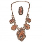 A PETRIFIED WOOD SQUASH BLOSSO