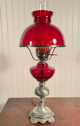A pewter table lamp from the