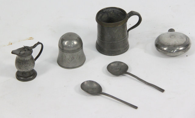 A pewter tumbler cup monogrammed