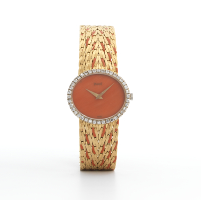 A Piaget Gold Diamond and Coral