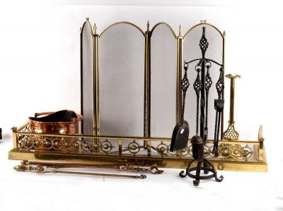A pierced brass fire curb, a