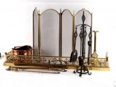 A pierced brass fire curb, a b