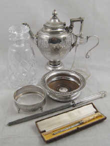 A pierced silver circular frame a