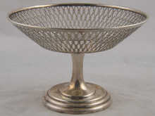 A pierced silver dish on stand