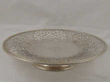 A pierced silver dish on stand by