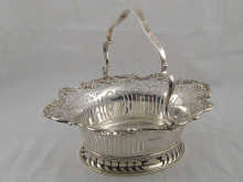 A pierced silver swing handle