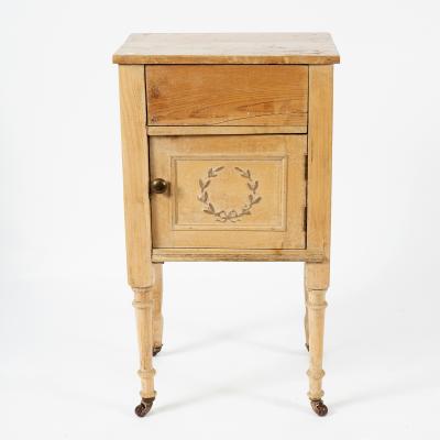A pine bedside table carved a