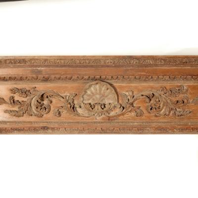 A pine fire surround with shell and