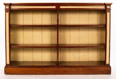 A pine open bookcase of four fitted