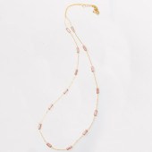 A PINK TOURMALINE AND EIGHTEEN