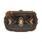 A pique, tortoiseshell and gil