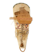 A PLAINS BEADED HIDE CRADLE BO