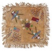 A PLAINS BEADED HIDE CUSHION C