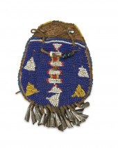 A PLAINS BEADED HIDE "STRIKE-A