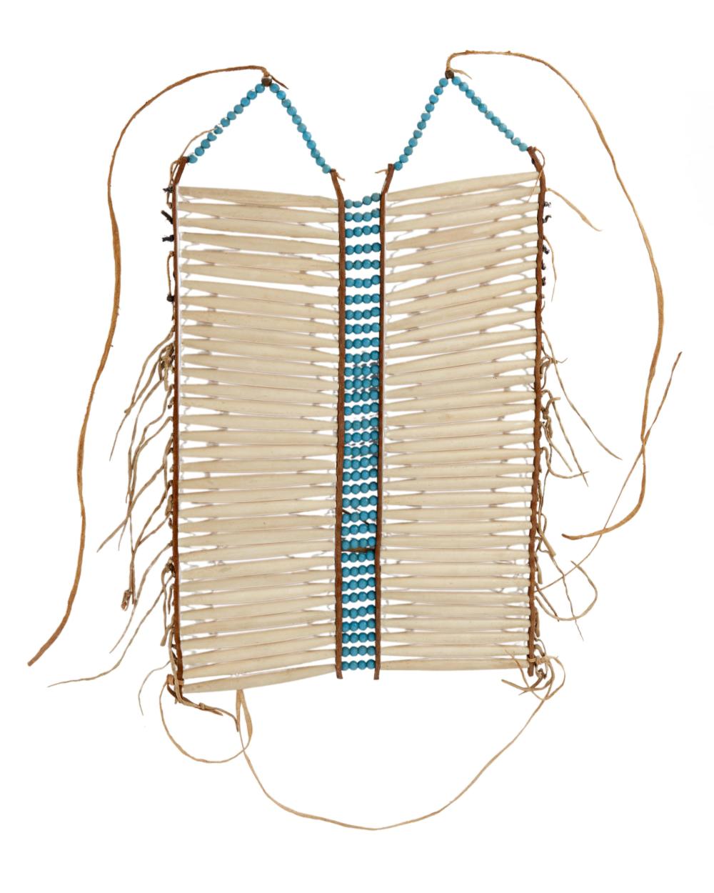 A PLAINS INDIAN HAIRPIPE WOMEN'S