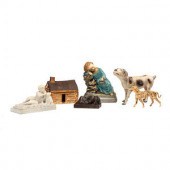 A Plaster Child's Log Cabin, T