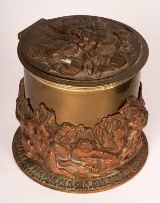A plated biscuit barrel, applied