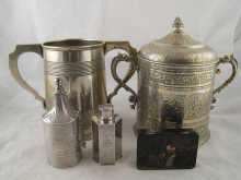A plated biscuit barrel in the