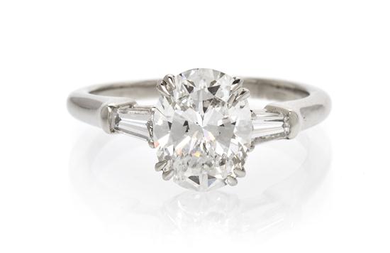 A Platinum and Diamond Ring Harry